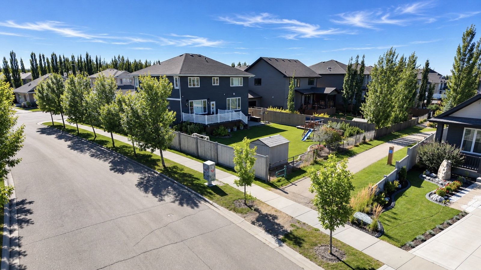 Aerial view of custom homes and backyards at Deer Park Estates