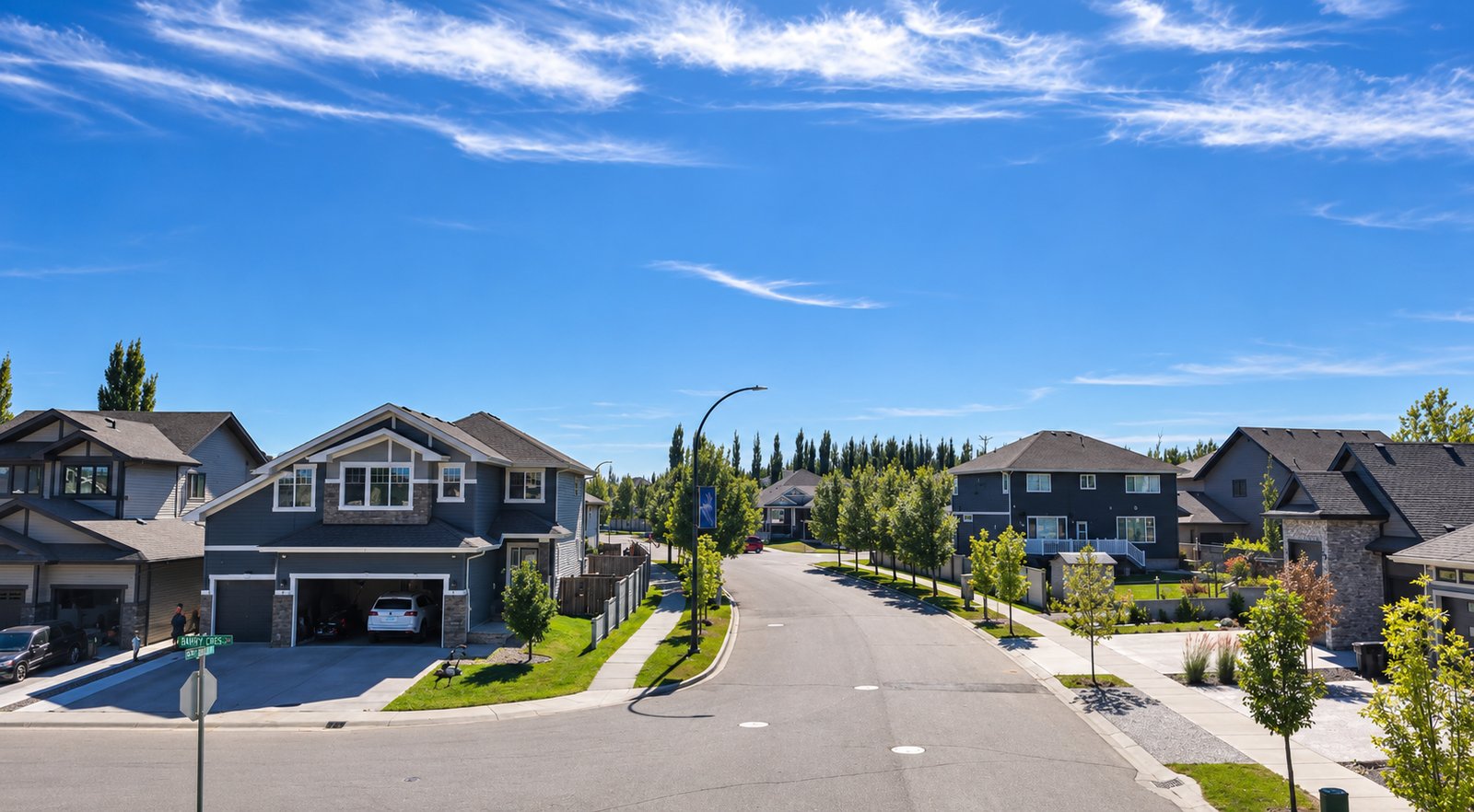 Streetscape of custom homes on a Deer Park Estates street, Spruce Grove